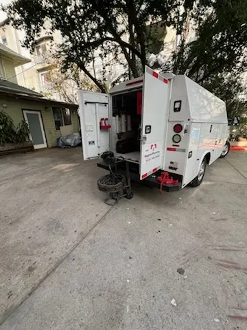 Magnet Plumbing service vehicle on-site for Grease Trap Cleaning in Riverside Gardens
