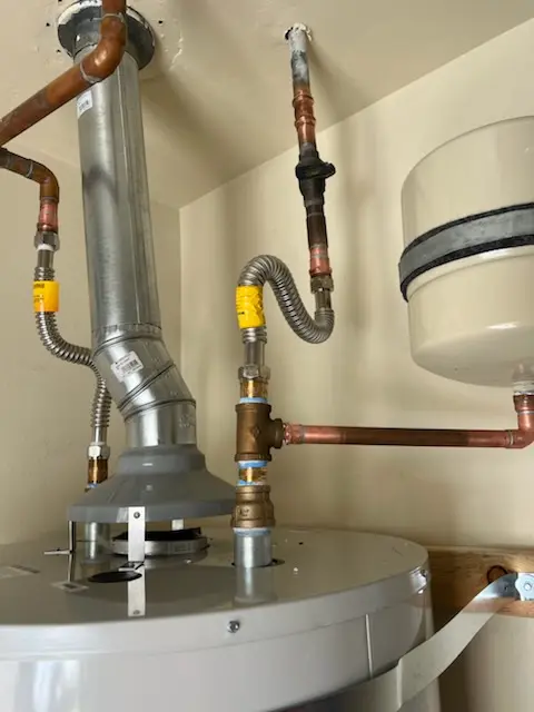 Water heater installation and plumbing repair in Riverside Gardens
